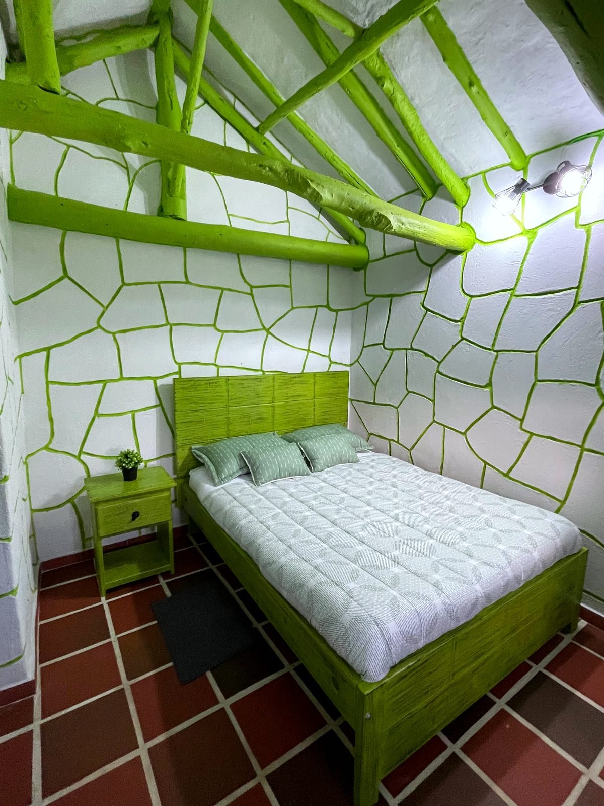 Habitación con cama doble de la Casa Encanto