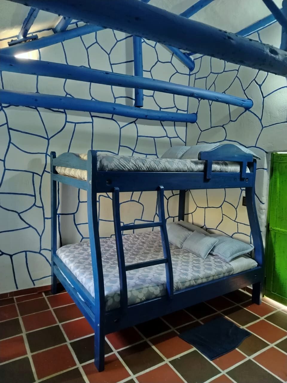 Habitación con camarotes de la Casa Encanto